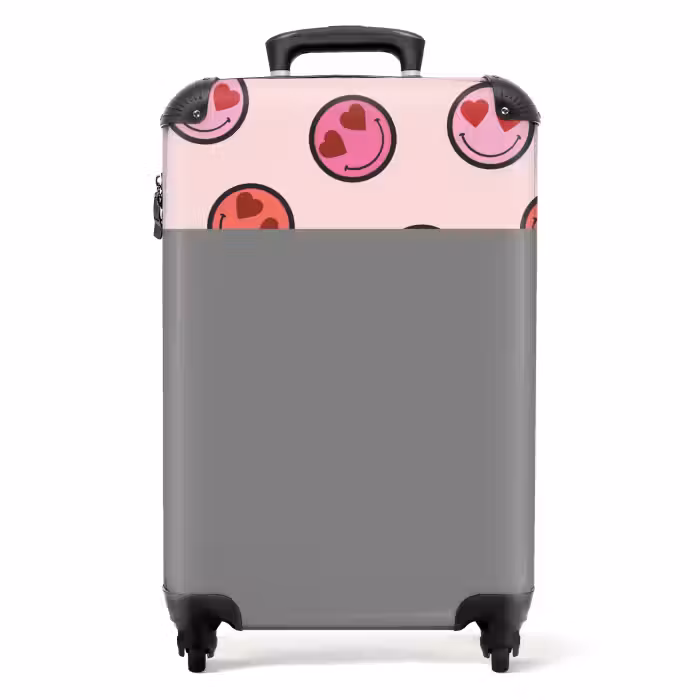 Suitcase - Pink smiley faces on a pink background