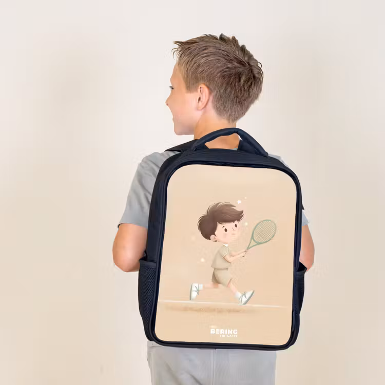 Kids backpack - Black - Boy plays tennis on sand-colored background — 2