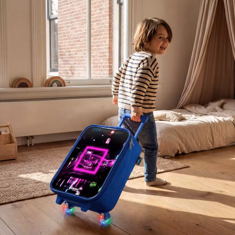 Children's suitcase - Blue - Bright pink square above a wet street — 2