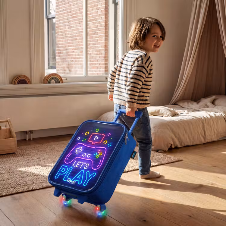Children's suitcase - Blue - Neon controller against a brick wall — 2