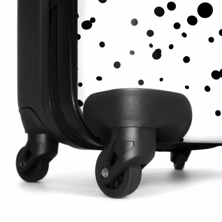 Suitcase - Black dots of varying sizes on a white background — 6