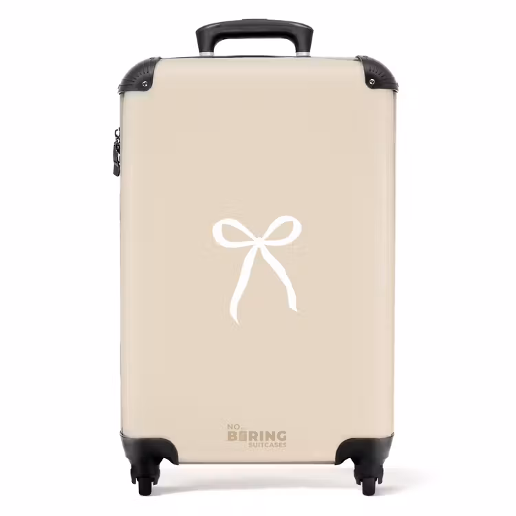 Suitcase - White bow on beige background — 1