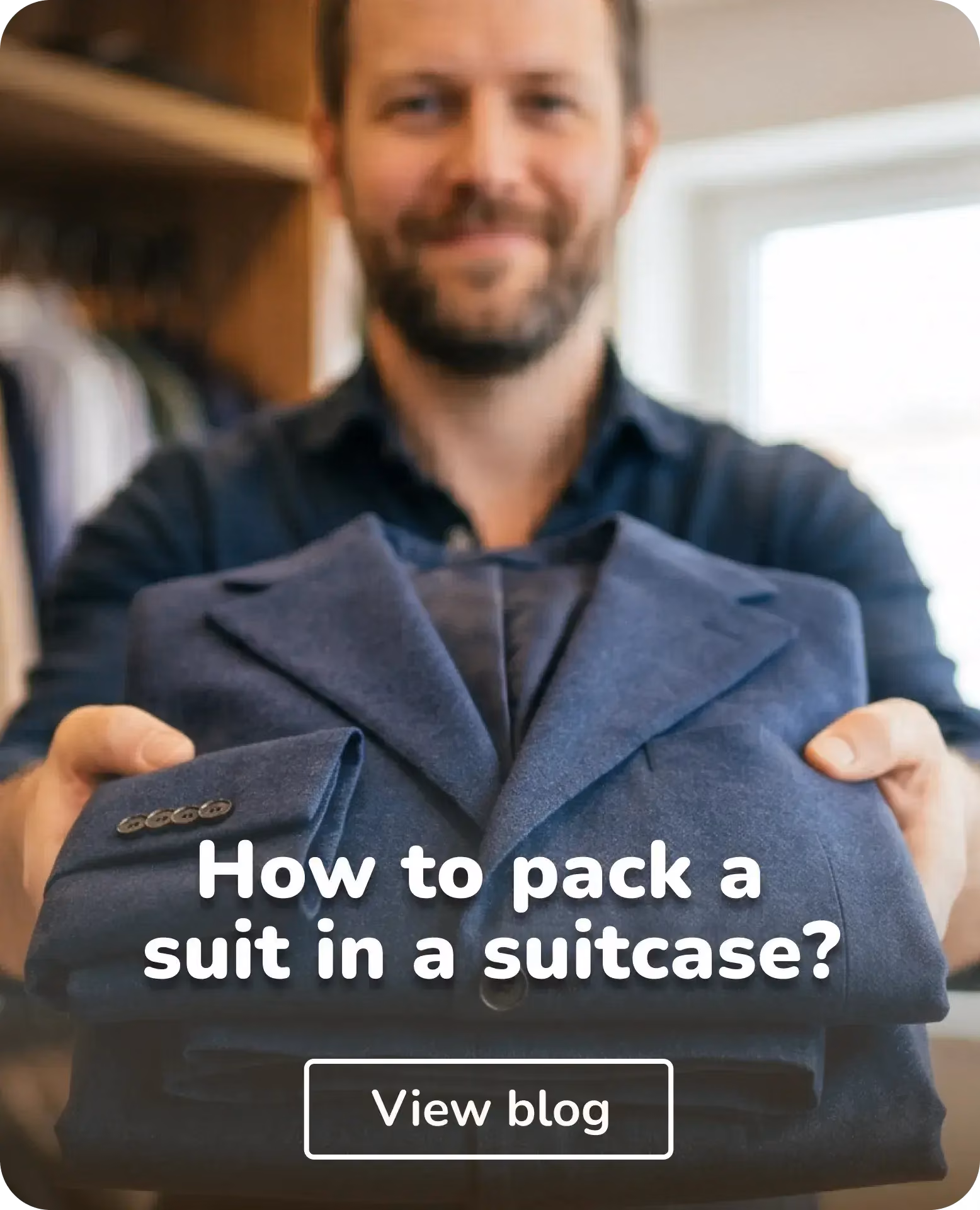 man with suit in his hands