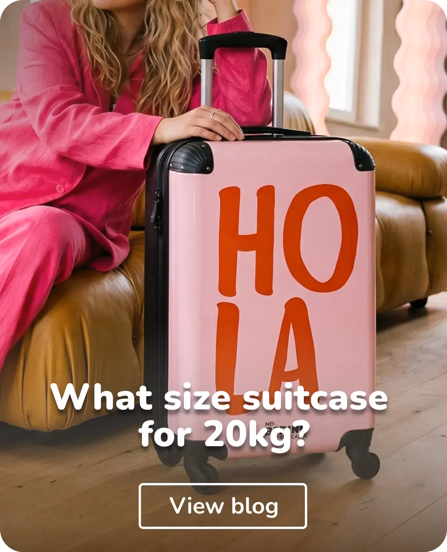 woman with ''hola'' suitcase